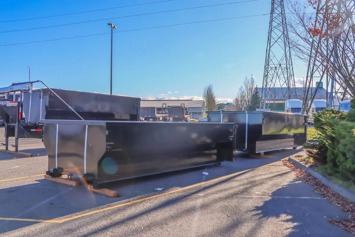 Roll-off dumpster ready for waste disposal at job site for Roofing Dumpster Rental in Winston-Salem